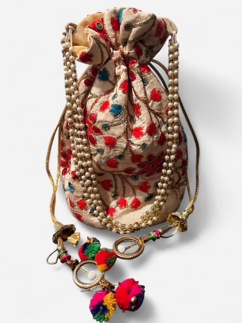 Elegant Embroidered Drawstring Potli Bag in Beige with Red & Blue Accents